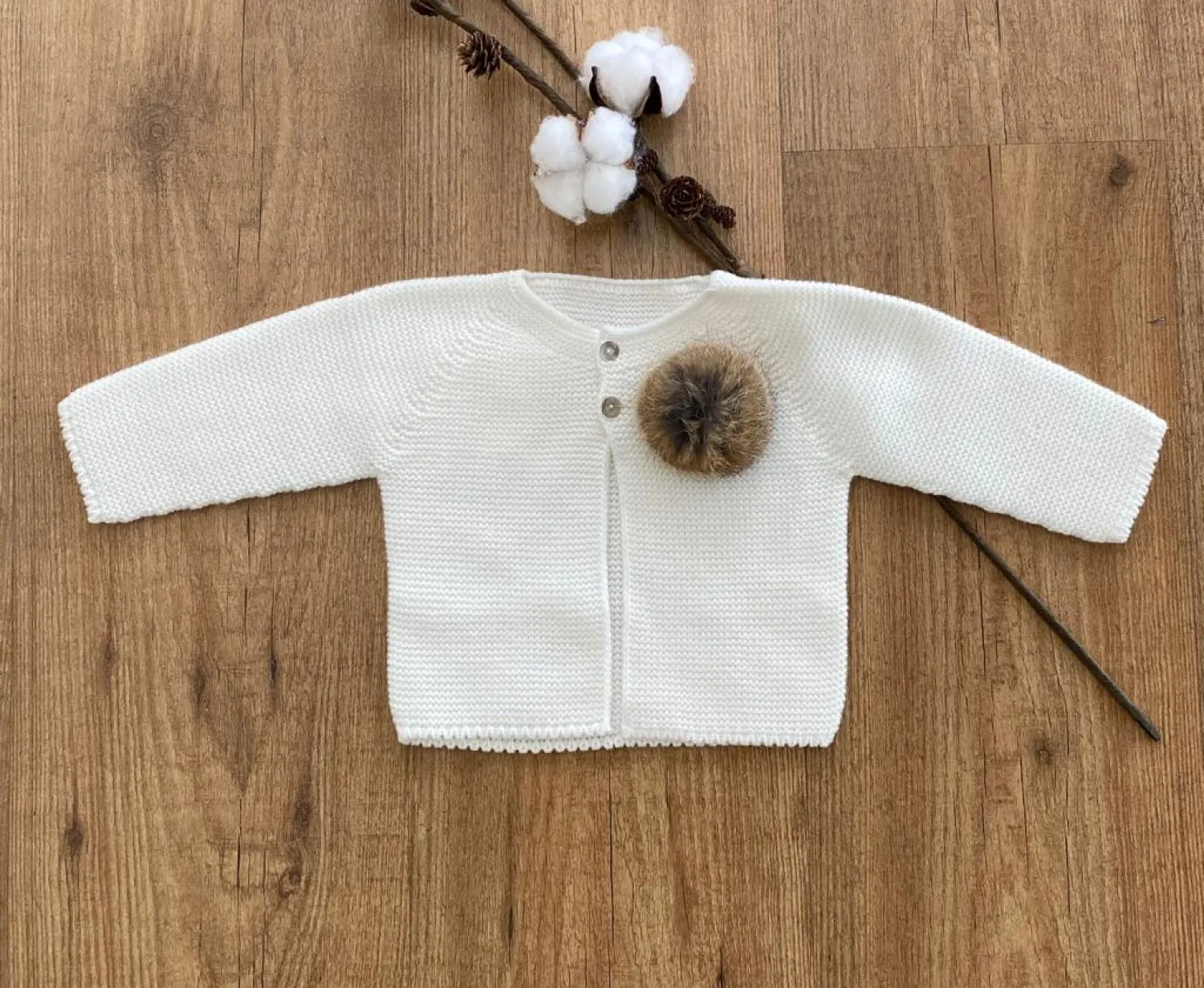 Jacket in two colors. Special christening or dressing, It has a natural hair pompom