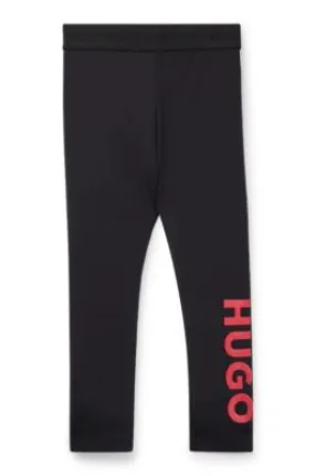 Leggings para niños de tejido elástico con logo vertical estampado