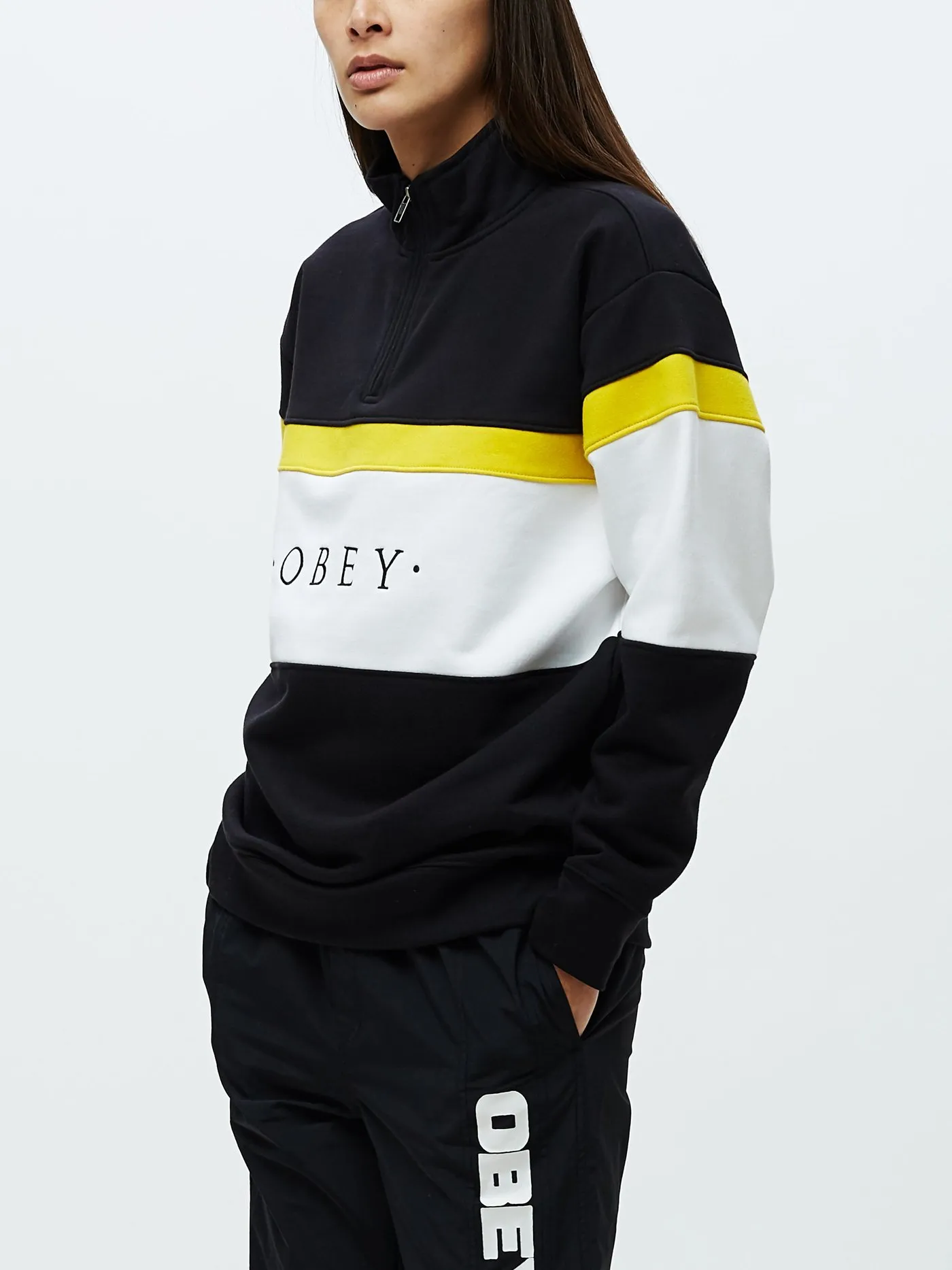 Sudadera OBEY cuello media cremallera mujer Lassen Half Zip Ref. 211620094 Negra con bandas amarillla y blanca