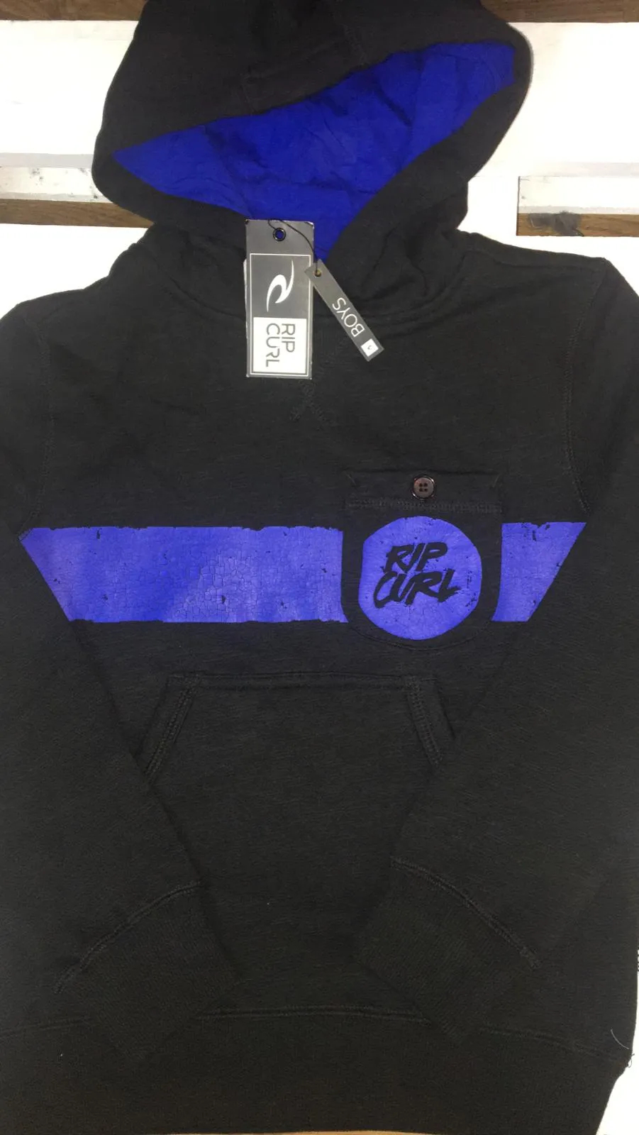 Sudadera Rip Curl niño con capucha Surf wear Ref. kfeam4 negra y logo azul